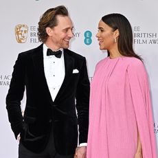 Tom Hiddleston and Zawe Ashton attend the EE British Academy Film Awards 2022 at Royal Albert Hall on March 13, 2022 in London, England