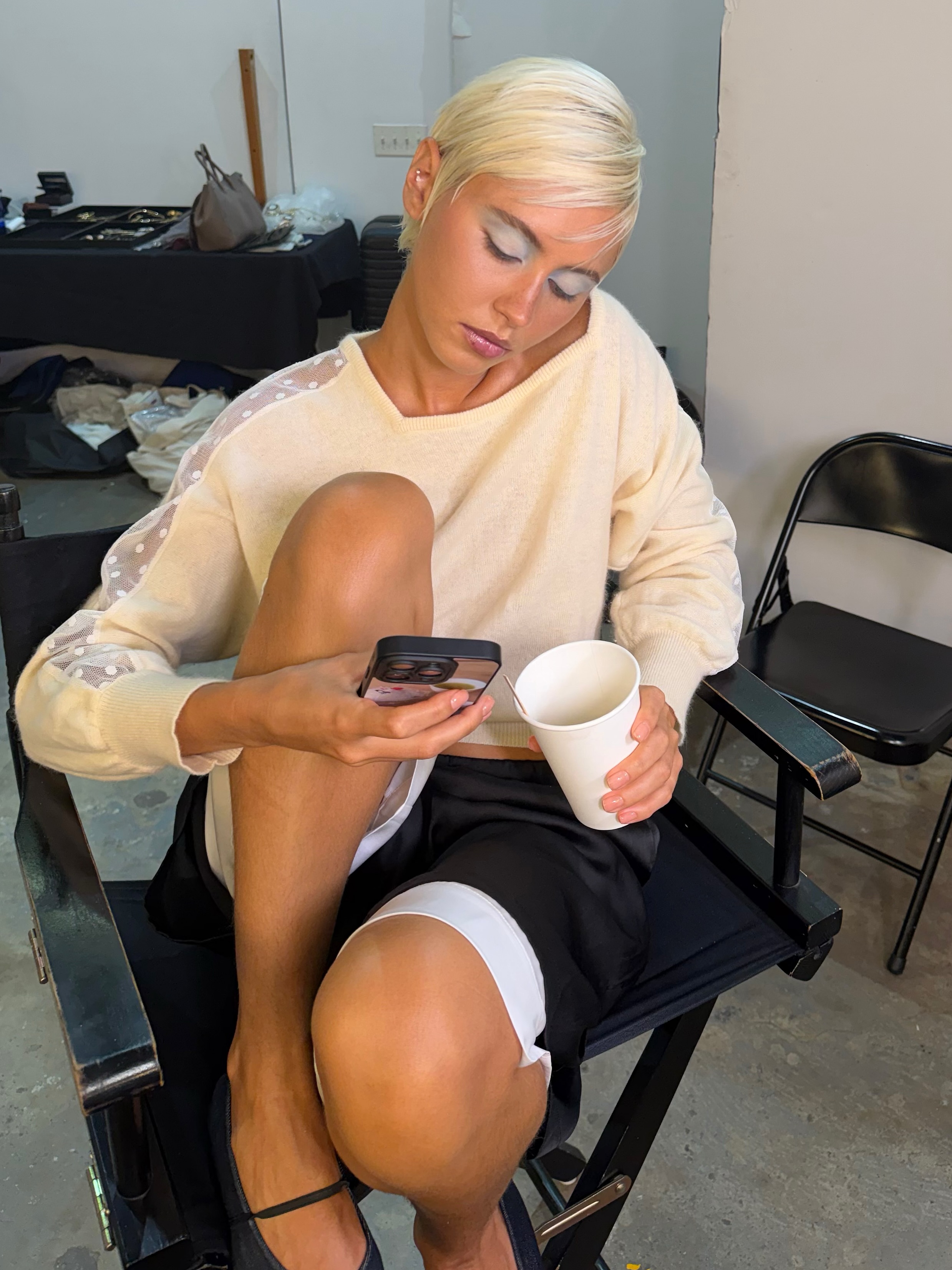 An image of Iris Law with a pixie cut and whisper fringe.