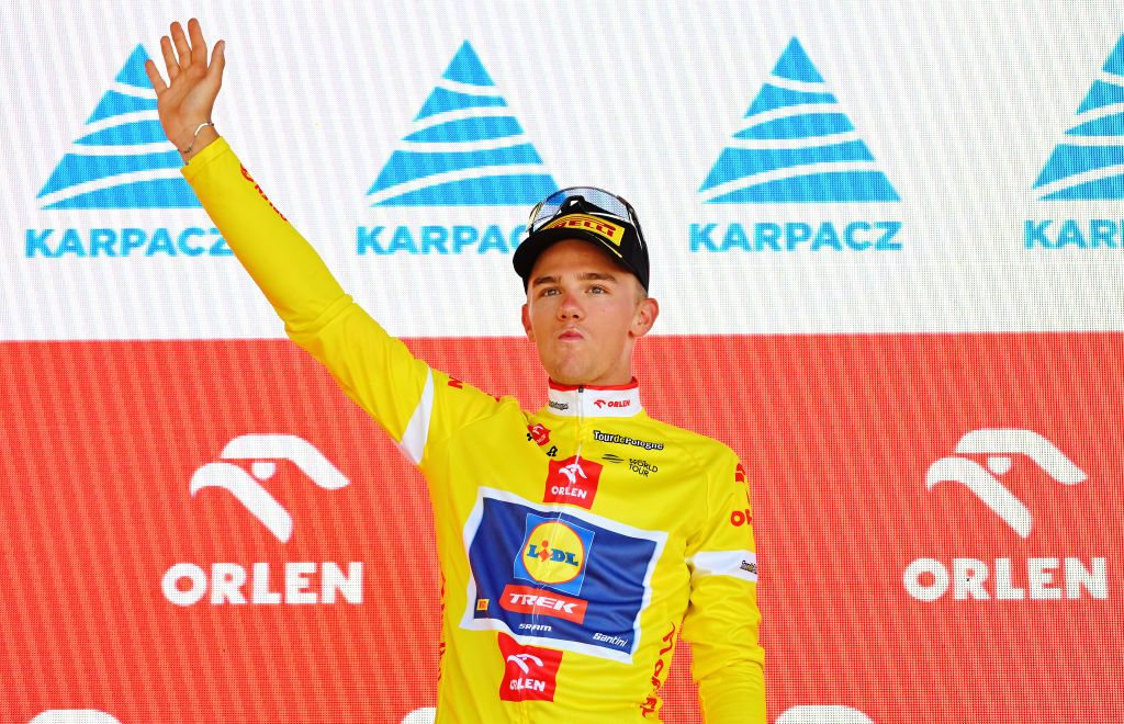 KARPACZ POLAND AUGUST 12 Thibau Nys of Belgium and Team LidlTrek celebrates at podium as Yellow leader jersey winner during the 81st Tour de Pologne Stage 1 a 1561km stage from Wroclaw to Karpacz 810m UCIWT on August 12 2024 in Karpacz Poland Photo by Luc ClaessenGetty Images