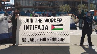 No Azure for Apartheid protesters holding Join the Worker Intifada - no labor for genocide! sign
