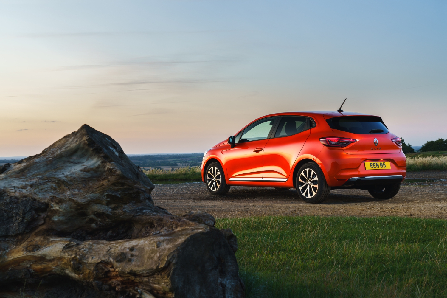 All new Clio dean smith Small in red coloured car