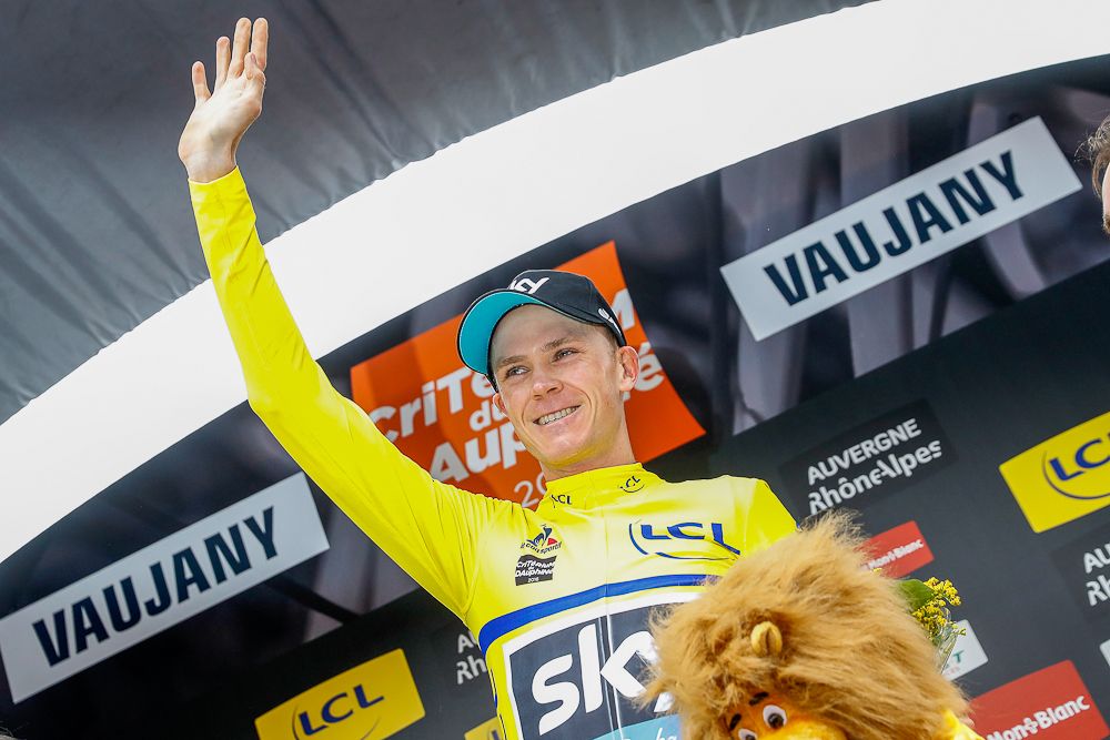 Chris Froome in yellow on the stage 5 podium at Criterium du Dauphine