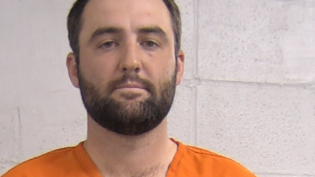 Mug shot of Scottie Scheffler after his arrest at the PGA Championship