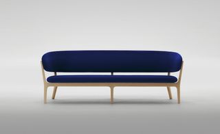 Wooden sofa with dark blue seating pads