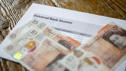 universal basic income page with money