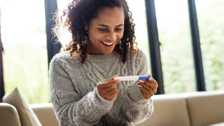 How to get pregnant: Woman receiving results of pregnancy test