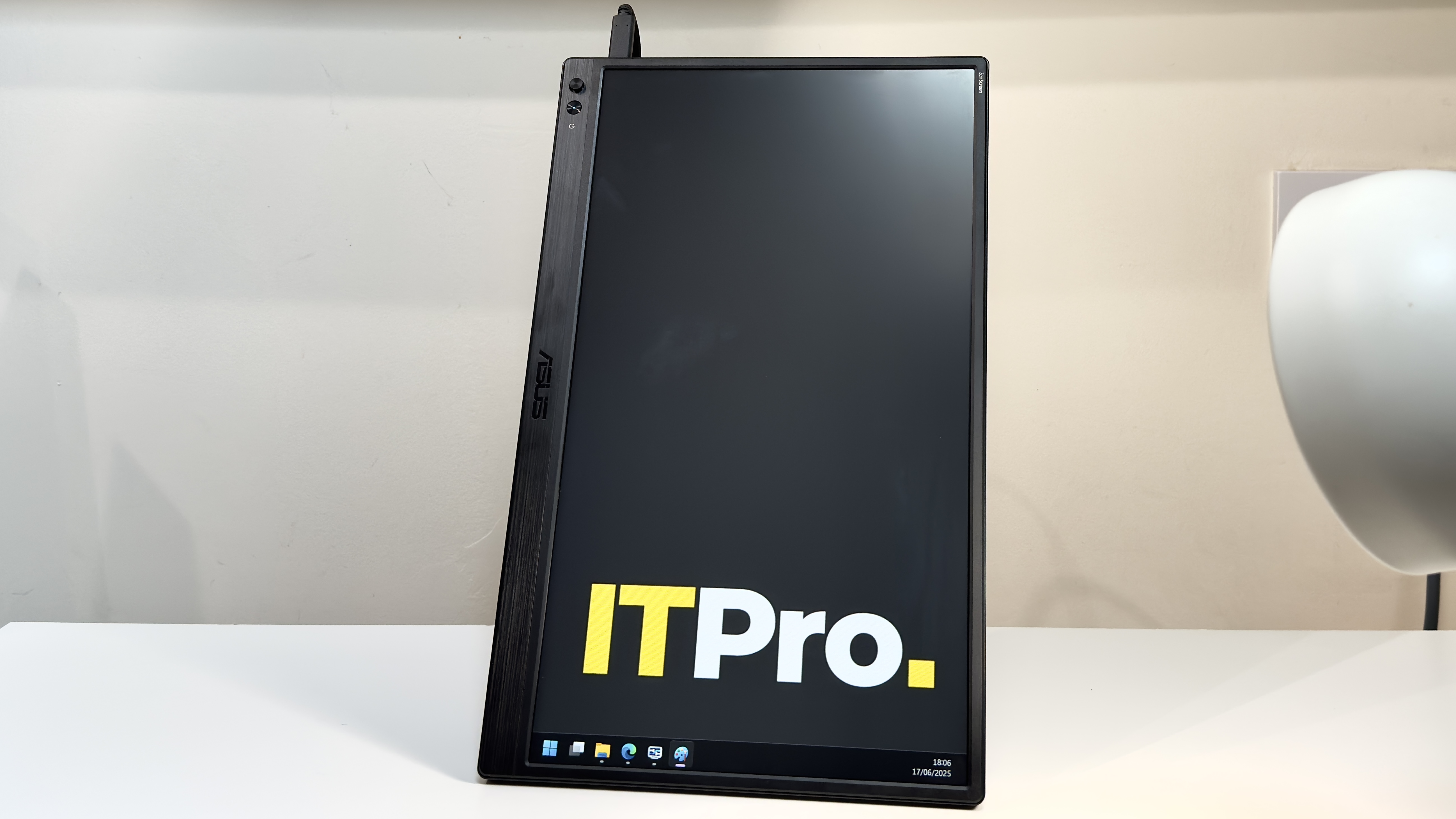 The Asus ZenScreen MB169CK on a desk