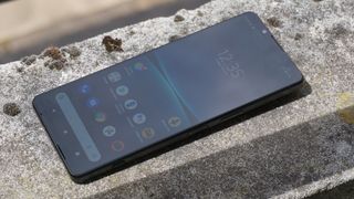 The Sony Xperia 1 IV on a concrete slab.