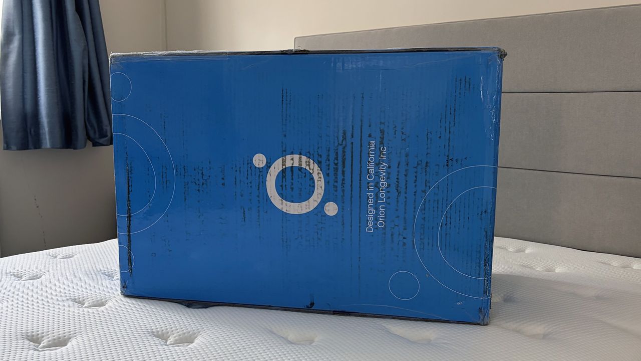 A blue Orion box on the bed in our reviewer's bedroom