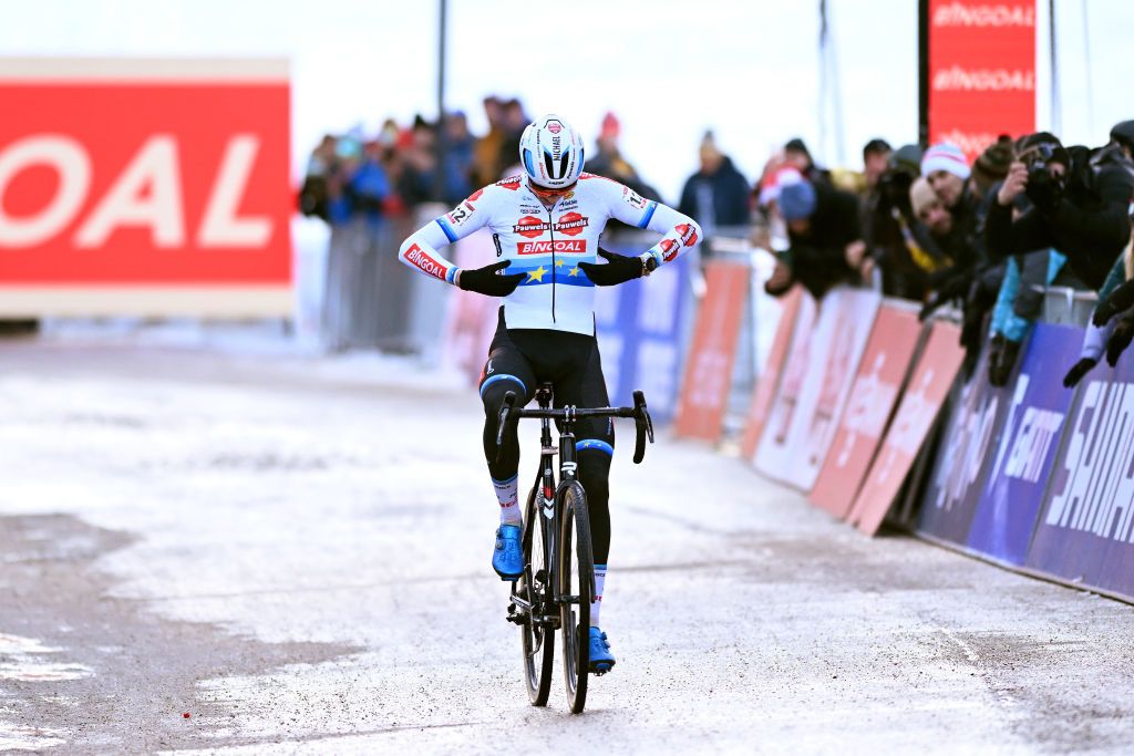 VERMIGLIO ITALY DECEMBER 17 Michael Vanthourenhout of Belgium and Team Pauwels Sauzen Bingoal celebrates at finish line as race winner during the 2nd UCI Cyclocross World Cup Val Di Sole 2022 Mens Elite CXWorldCup on December 17 2022 in Vermiglio Italy Photo by Dario BelingheriGetty Images