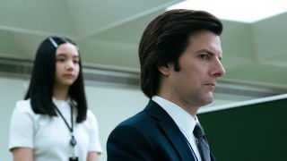 Mark sitting at his desk with Ms Huang in the background in Severance season 2 episode 6