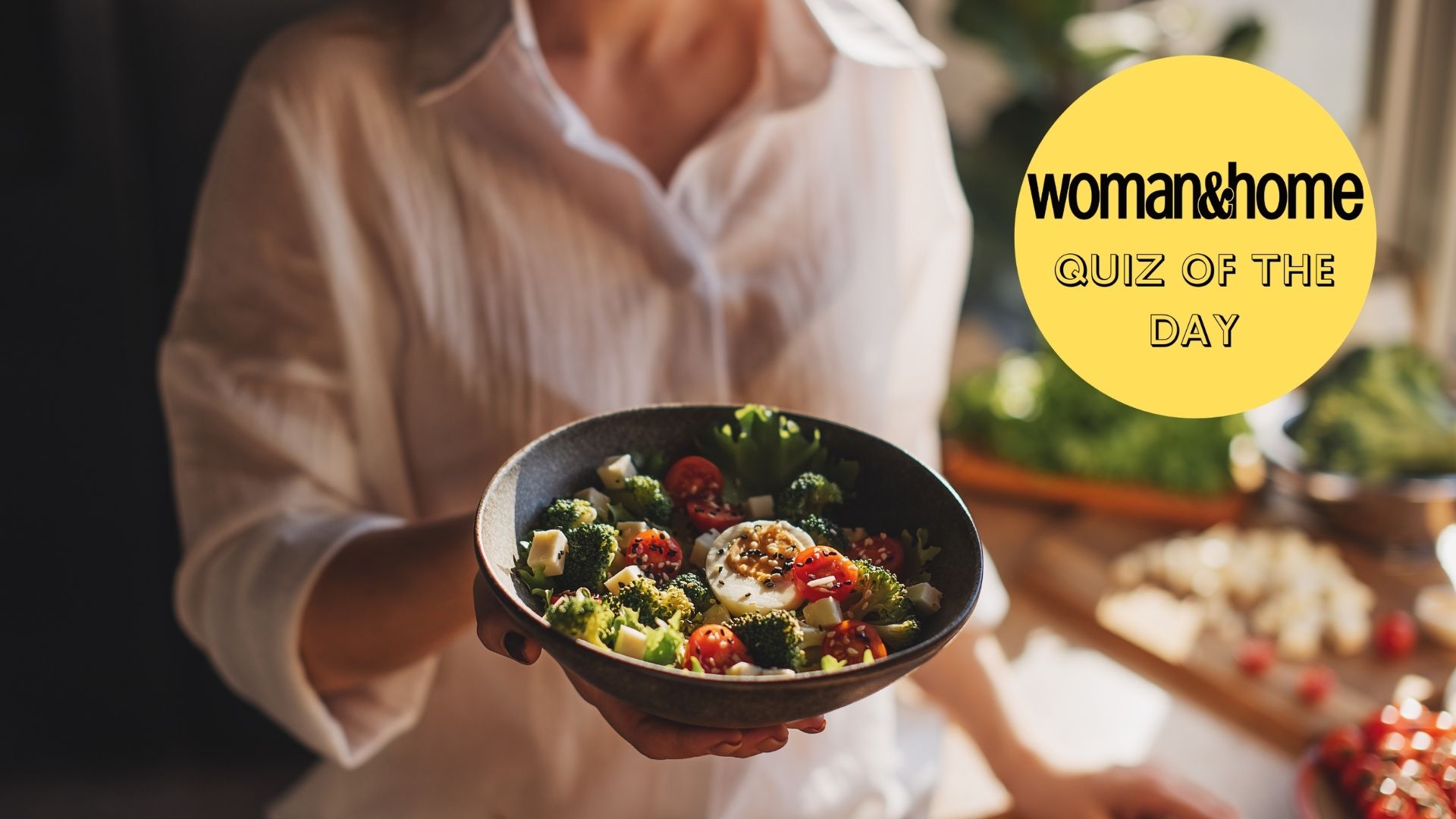 A woman holding a plate of food