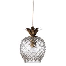 Zeus pineapple pendant light features gold leaves nestled against the sculpted glass body