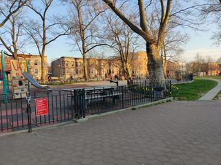 Standard 1x zoom of a playground at dusk