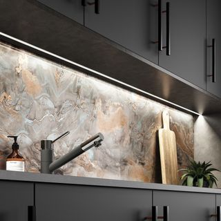 kitchen with contemporary glass splashback