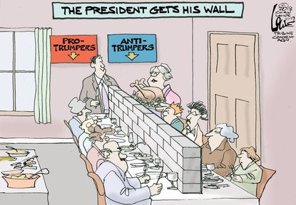 Political cartoon U.S. Thanksgiving dinner Trump supporters build a wall