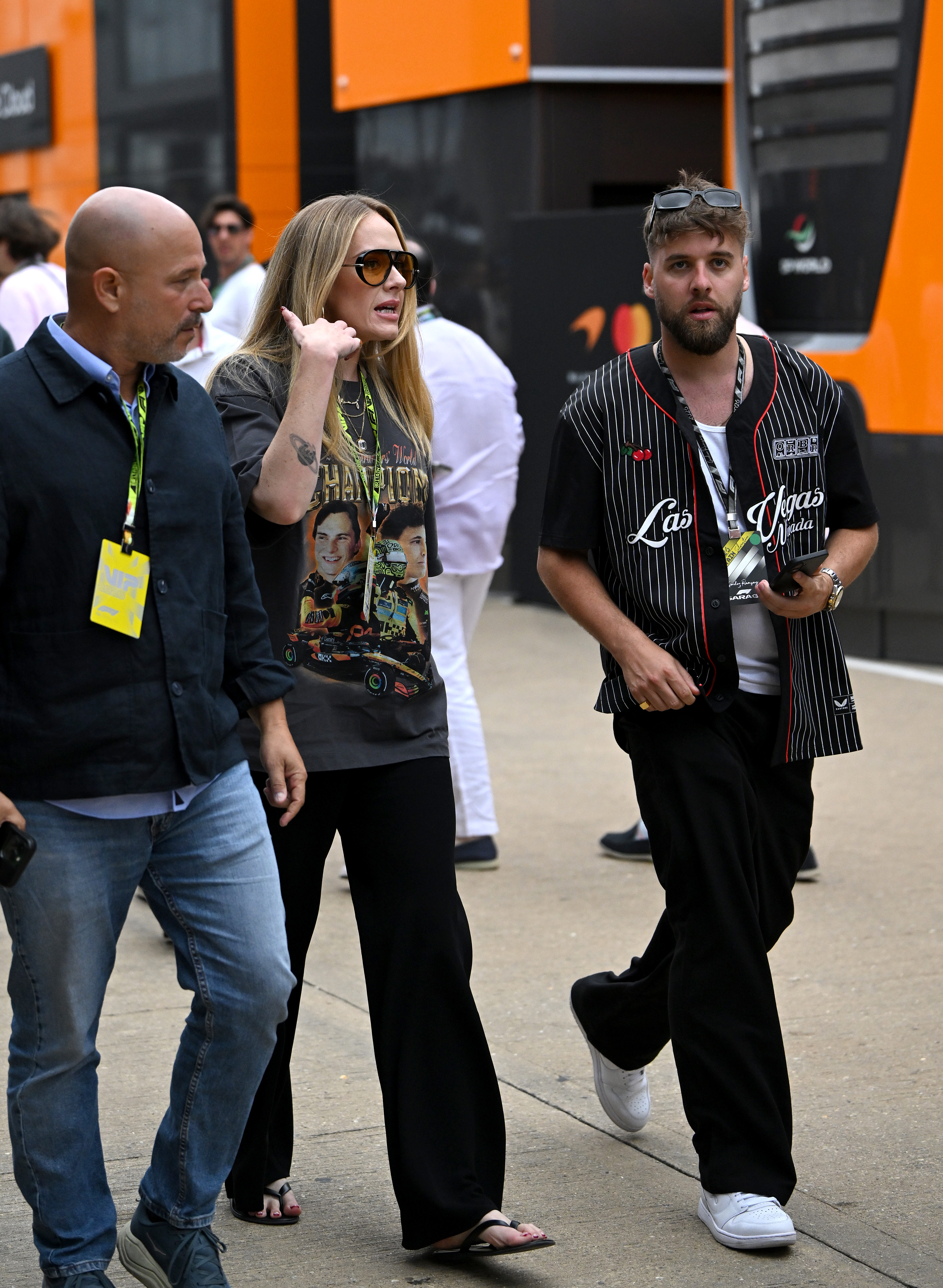 Adele arrived at the Formula 1 British Grand Prix in the graphic tee trend and flip-flops