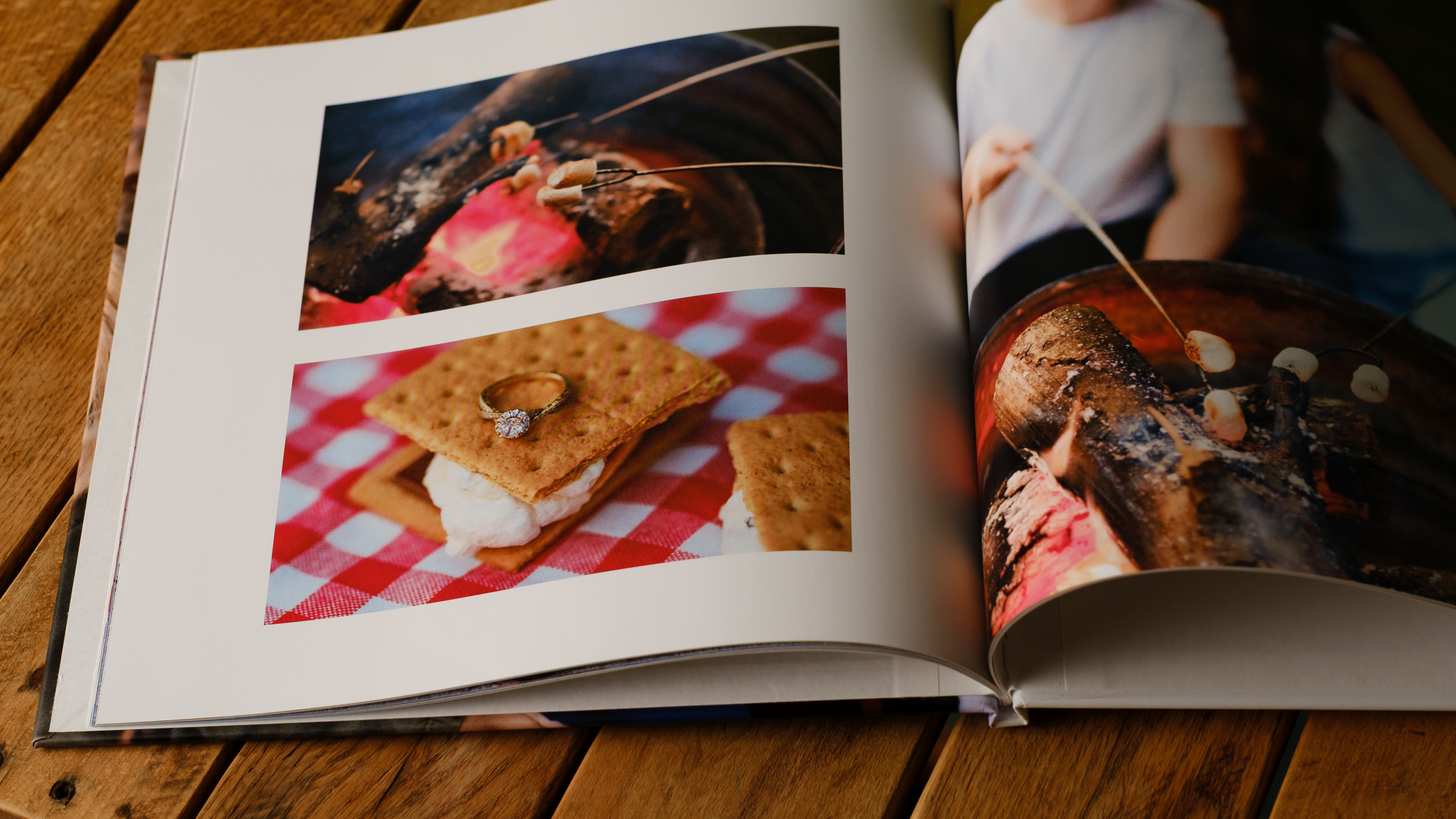 A photo book from Nations Photo Lab on a desktop