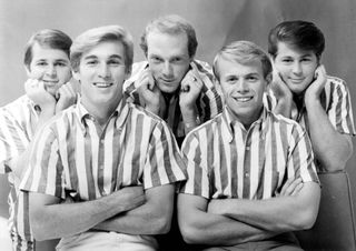 A black and white picture of the Beach Boys from 1964 
