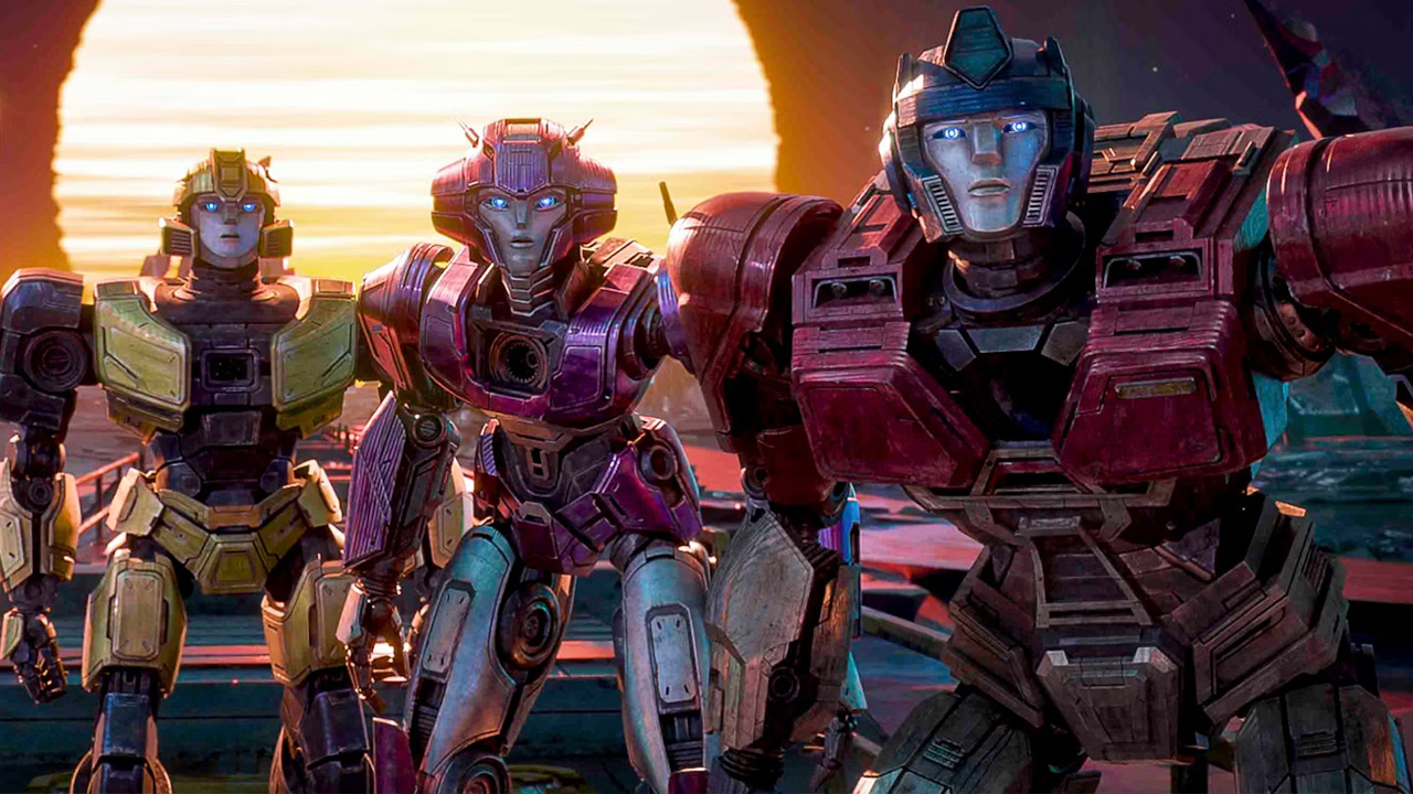 Bumblebee, Elita-1, and Optimus Prime stare directly into the camera in Transformers One