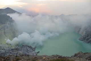 The view looking west across Ijen Crater lake with the sulfur dome visible in the lower left of the frame.