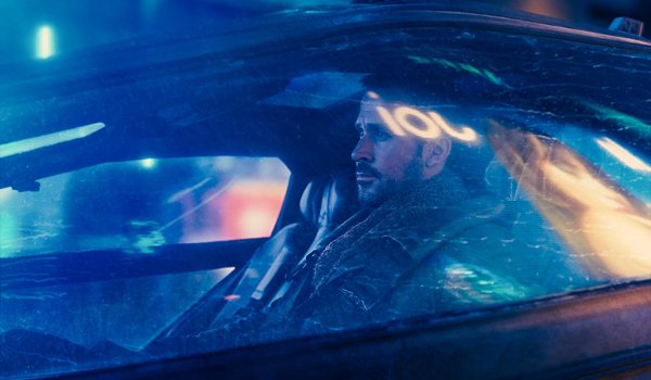 Blade Runner 2049 Ryan Gosling Officer K riding in his car at night