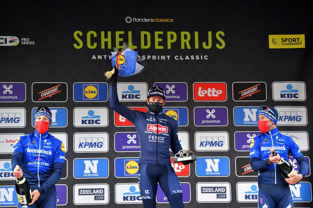 SCHOTEN BELGIUM APRIL 07 Podium Sam Bennett of Ireland and Team Deceuninck QuickStep Jasper Philipsen of Belgium and Team AlpecinFenix Mark Cavendish of United Kingdom and Team Deceuninck QuickStep Celebration during the 109th Scheldeprijs 2021 Mens Elite a 1942km race from Terneuzen to Schoten Mask Covid Safety Measures Trophy SP21 FlandersClassic on April 07 2021 in Schoten Belgium Photo by Luc ClaessenGetty Images
