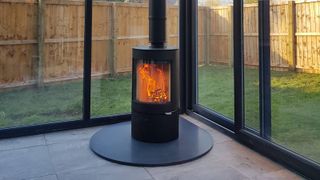 modern log burning stove in conservatory