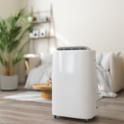 Portable air conditioner in a Scandi inspired living room
