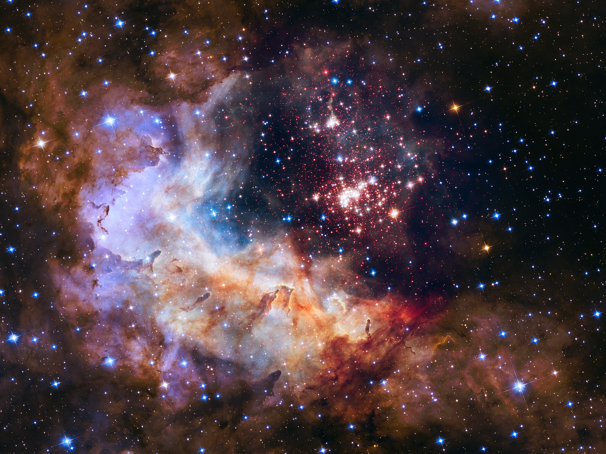 Clouds of pink, purple, orange and blue sit next to a bunch of white dots over a black background
