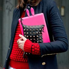 Woman holding accessories