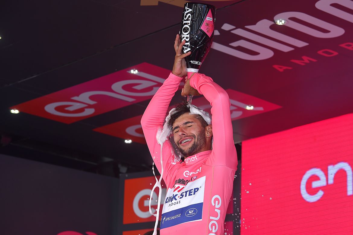 Fernando Gaviria was understandably excited to take the Giro d'Italia's pink jersey.