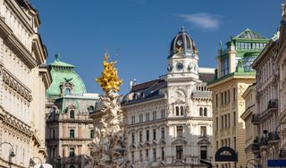 The Pestsäule (Plague Column) and the prestigious buildings of Graben street - Vienna, Austria