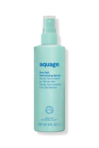 A bottle of Aquage Sea Salt Texturizing Spray set against a white background.