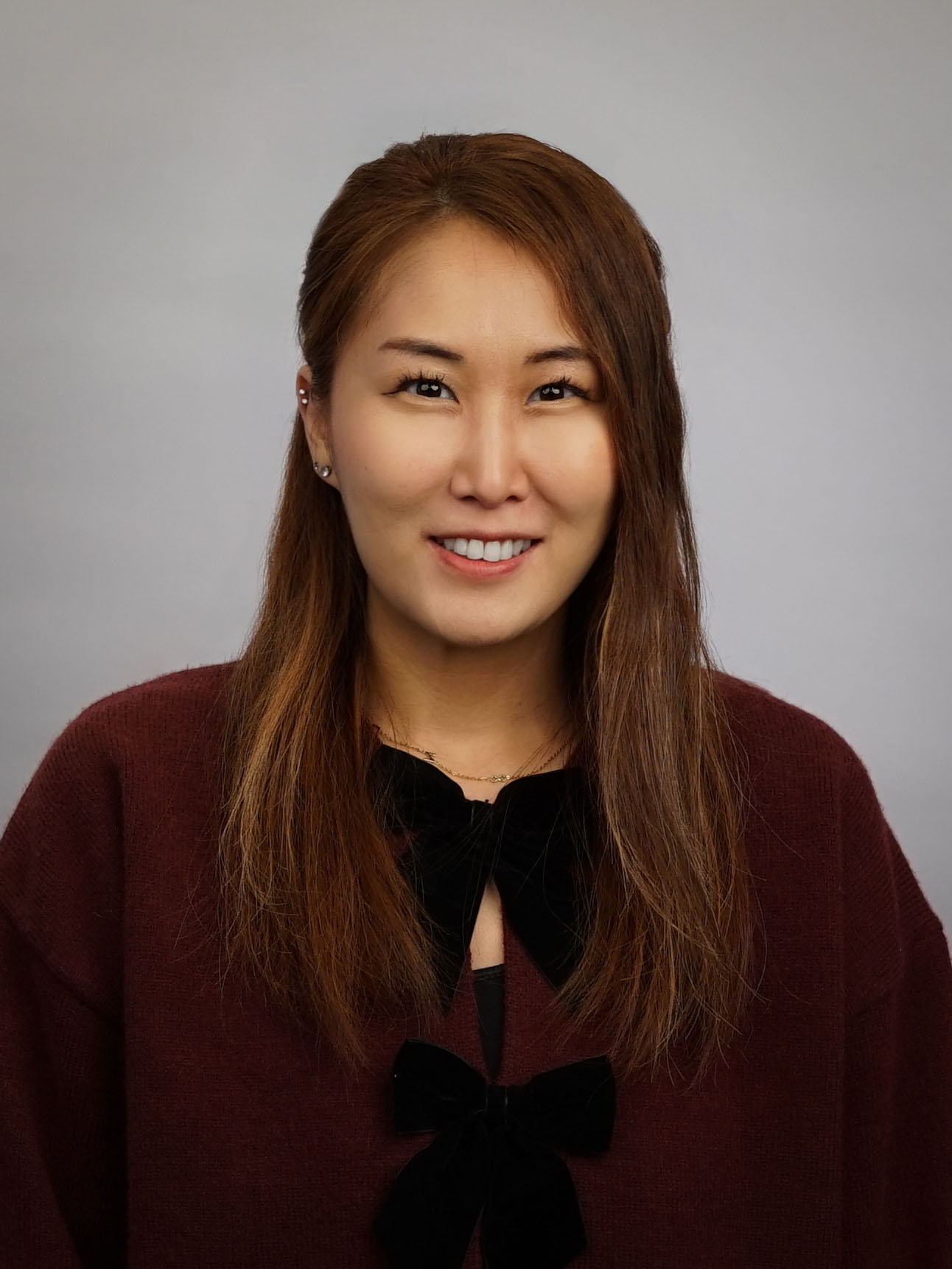 Smiling headshot of Mina Shin.