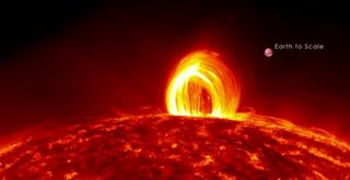 A huge loop of plasma "rain" falls on the sun in this screenshot from a video captured by NASA's Solar Dynamics Observatory spacecraft on July 19, 2012.