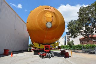 The space shuttle external tank ET-94 was moved Sunday, May 22, 2016 onto the concrete pad at the California Science Center where it will be restored and prepared for its display with the orbiter Endeavour.