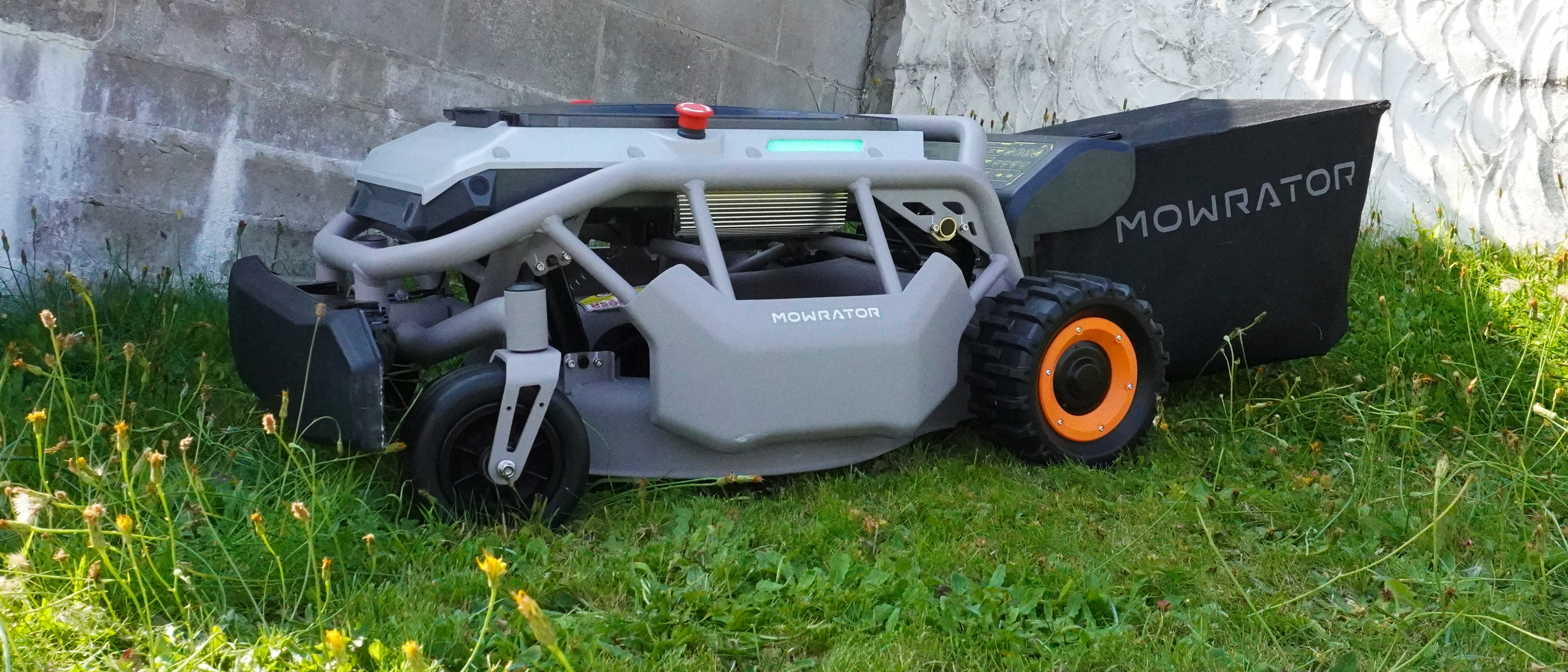 Mowrator S1 2WD lawnmower photographed on green grass.