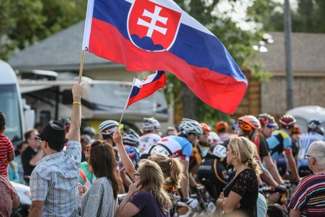 Fans cheer as the group comes into town.