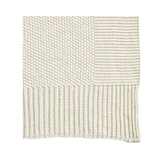 A white knitted blanket