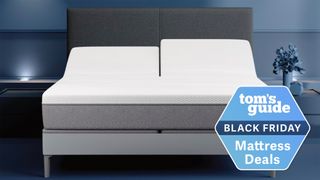 Sleep Number i8 Smart Bed on a grey bedframe in a blue bedroom with a Black Friday mattress deals badge overlaid