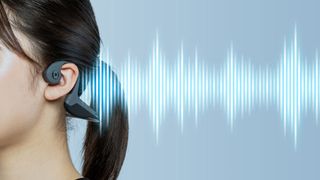Woman using bone conduction headphones