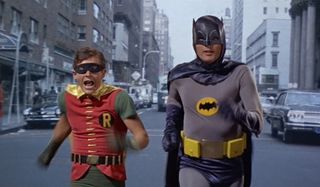 Batman: The Movie Batman Robin running the streets