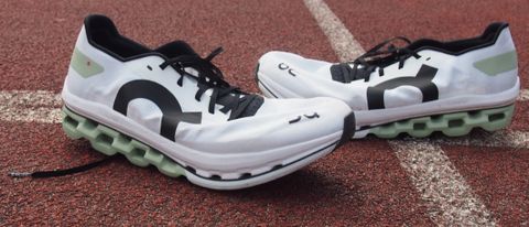 Pair of On Cloudboom Echo shoes on a running track