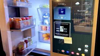 Samsung Bespoke AI Fridge scans food with touchscreen menu on display