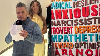 Robbie Williams next to art