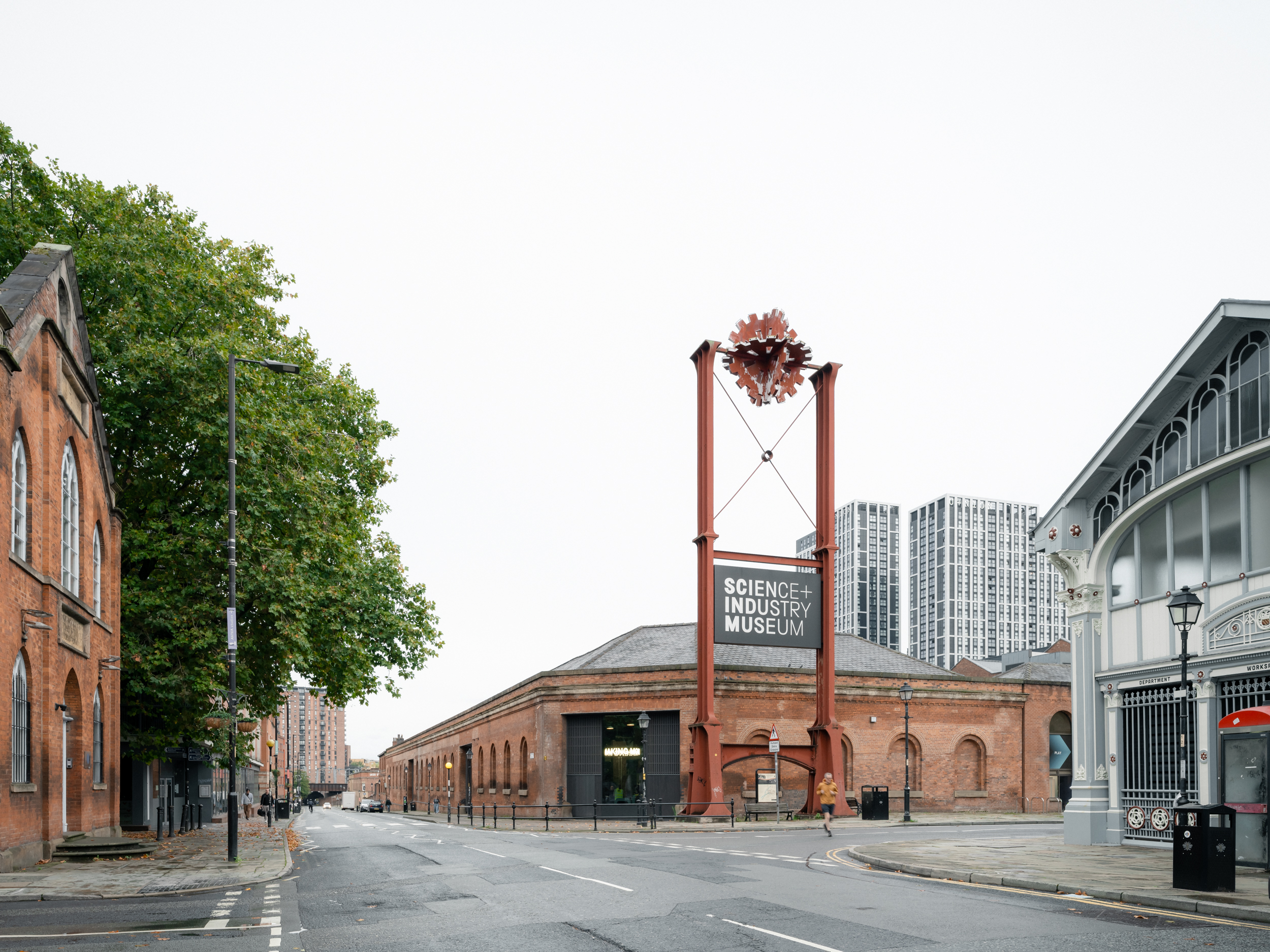 Power Hall by Carmody Groarke, a renovated warehouse with large machines, like old locomotives