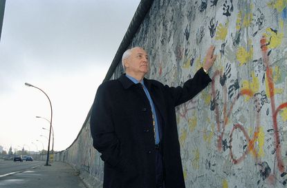 Mikhail Gorbachev at Berlin Wall in 1998