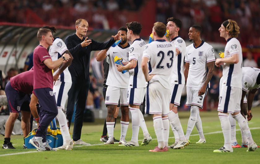 Thomas Tuchel delivers instructions to his England players during a water break