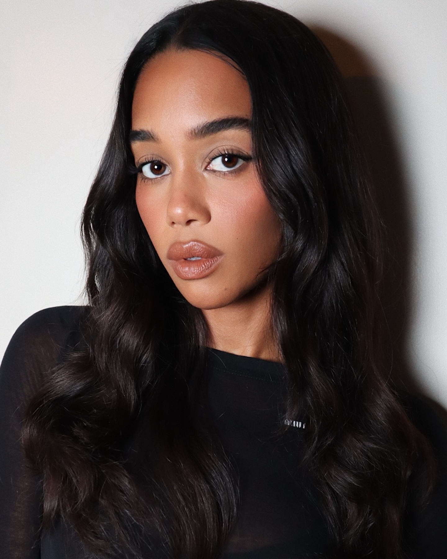 Bronzed makeup on Laura Harrier by Hung Vanngo